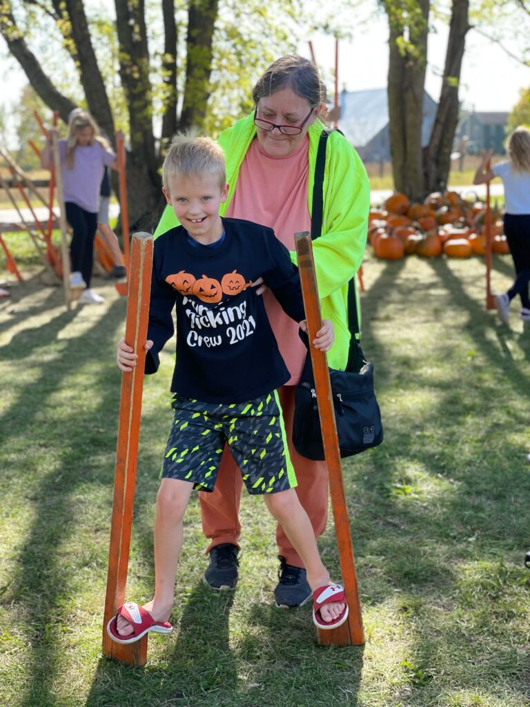 Barten Pumpkins kids playing on stilts